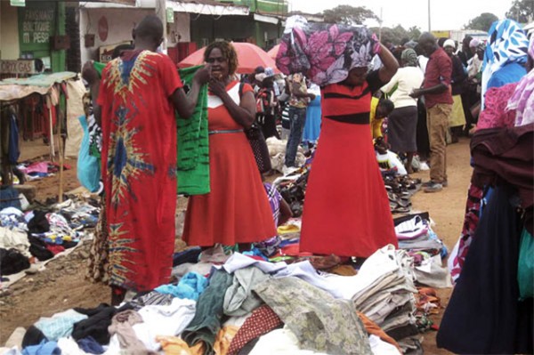 'US threats force EAC to back down on secondhand clothes ban' - Article